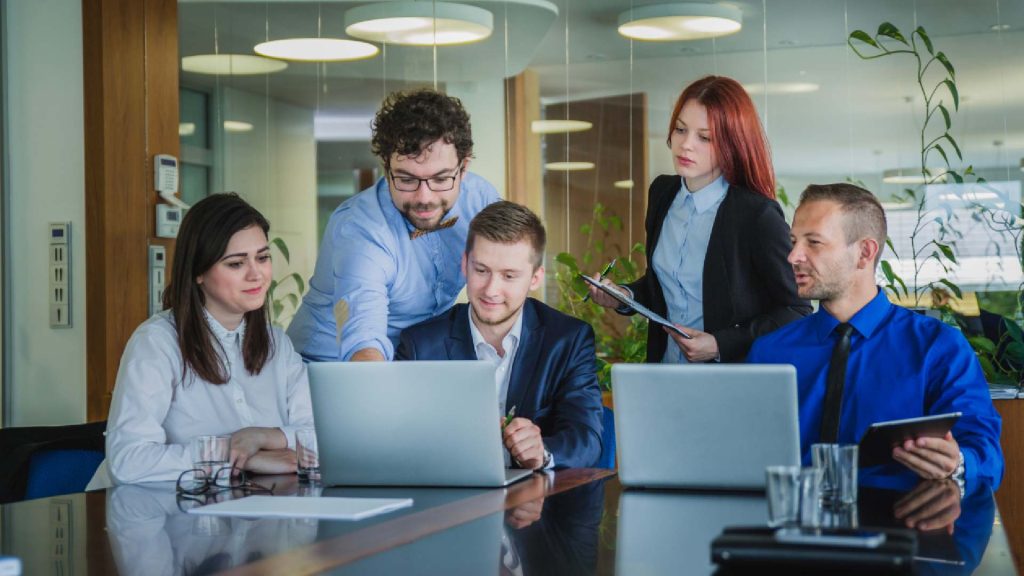 Why Our Solutions Define the Future of Digital Growth Creative People Working Office 1024x576