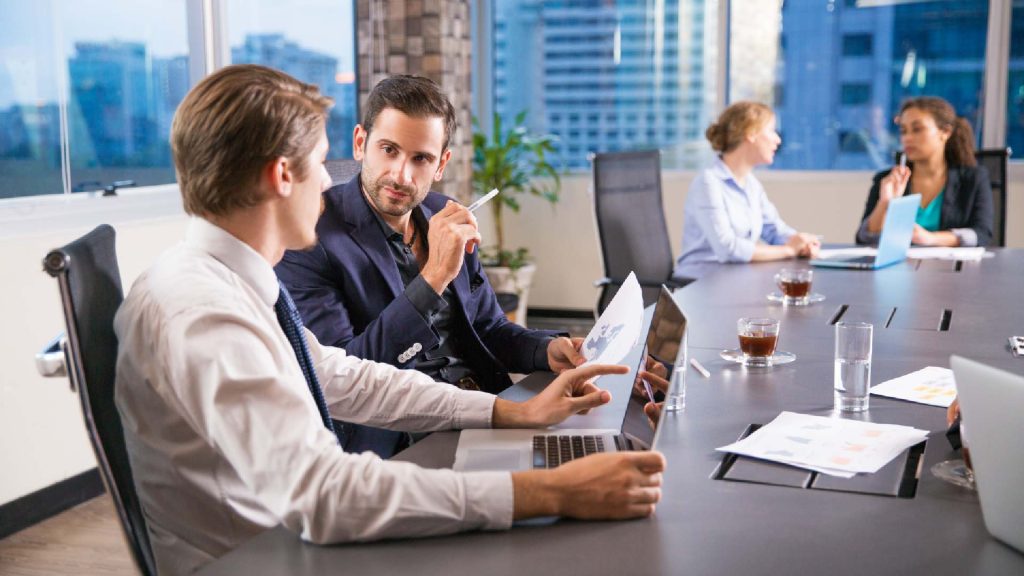 How Modern Digital Architecture Is Powering the Future of High-Performance Solutions Workers Long Wooden Table 1024x576